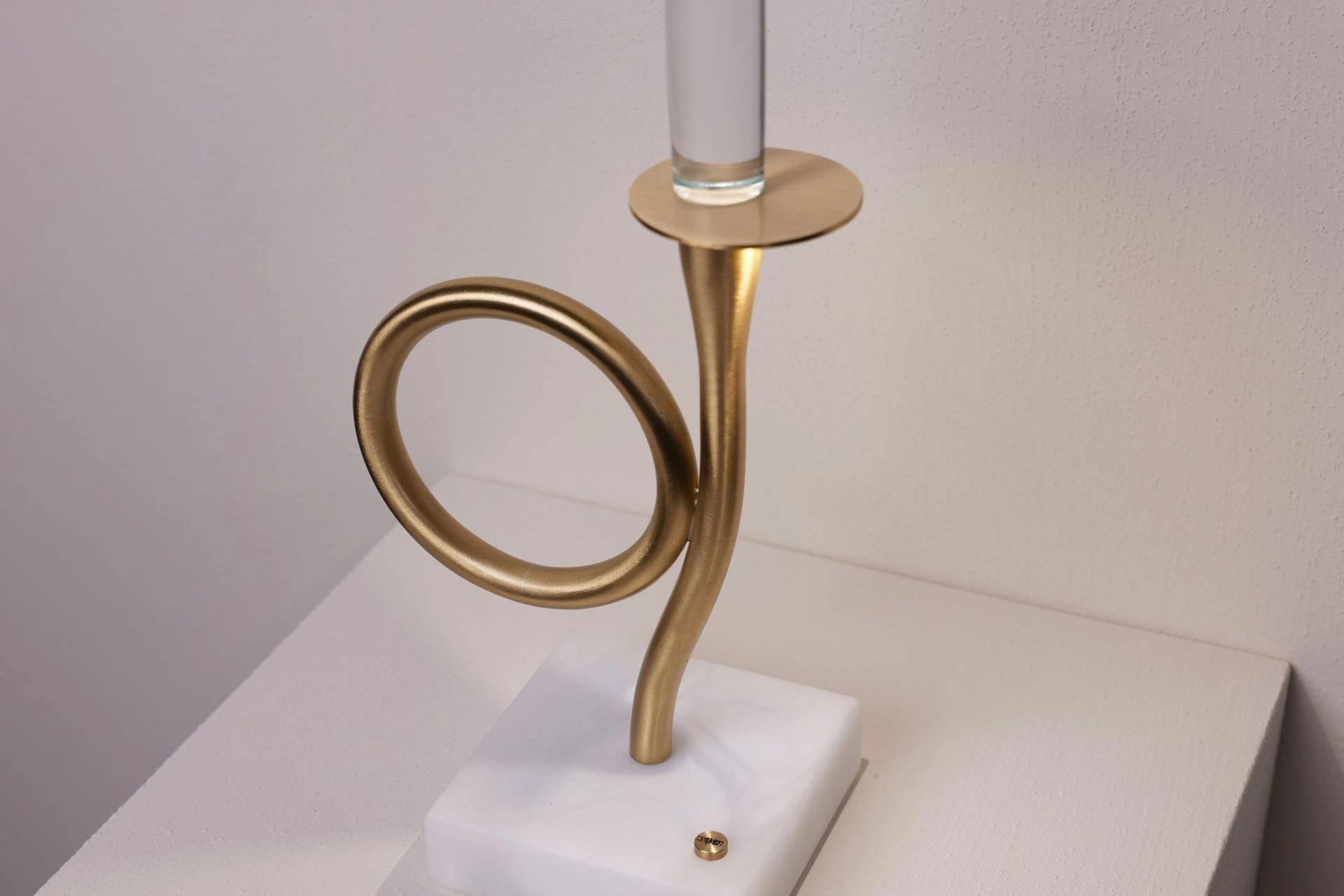 One-light edition — detail of the crystal candle and brass ring