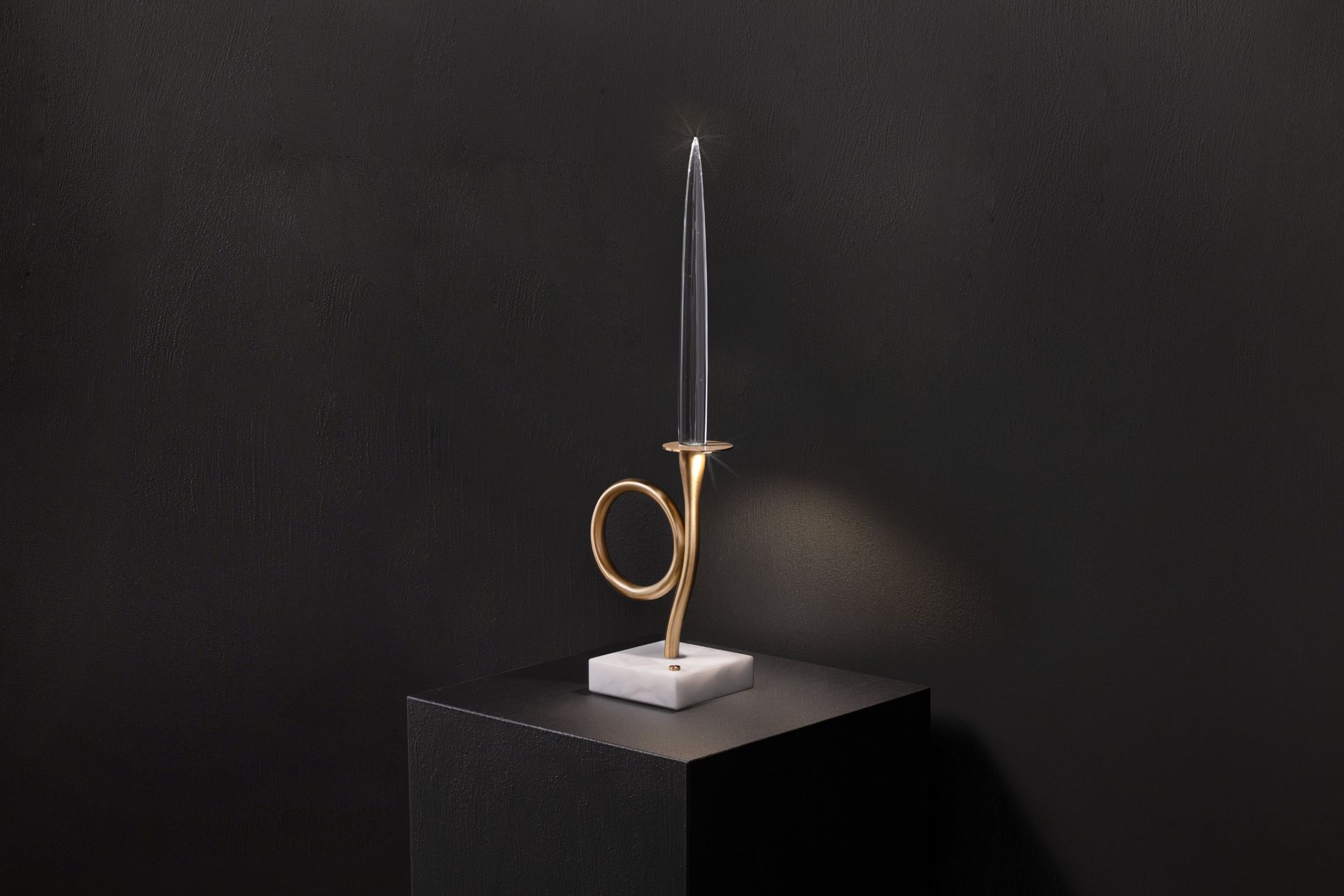 One-light edition — still life on black, perspective view