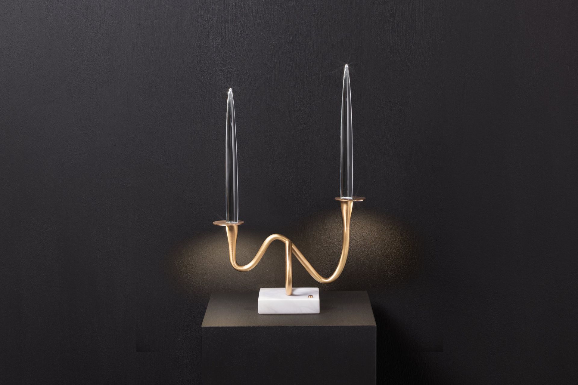 Two-light edition — still life on black, front view