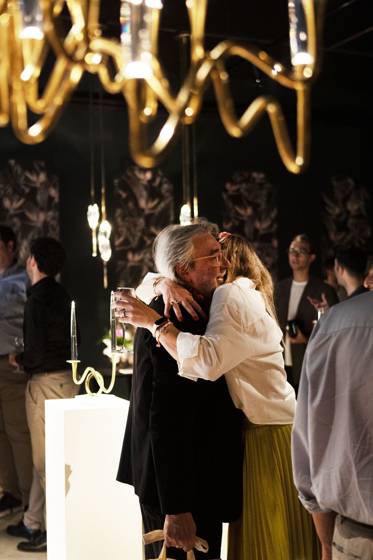 Barbara and Jean-Yves Malbos embracing at the event