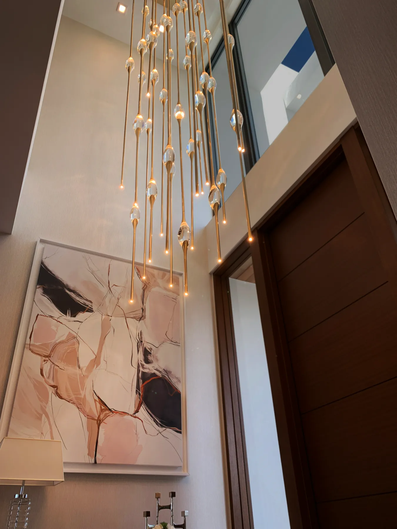 Il Pezzo 12 Cluster chandelier in the stairwell of a private mansion in Fort Lauderdale, Florida