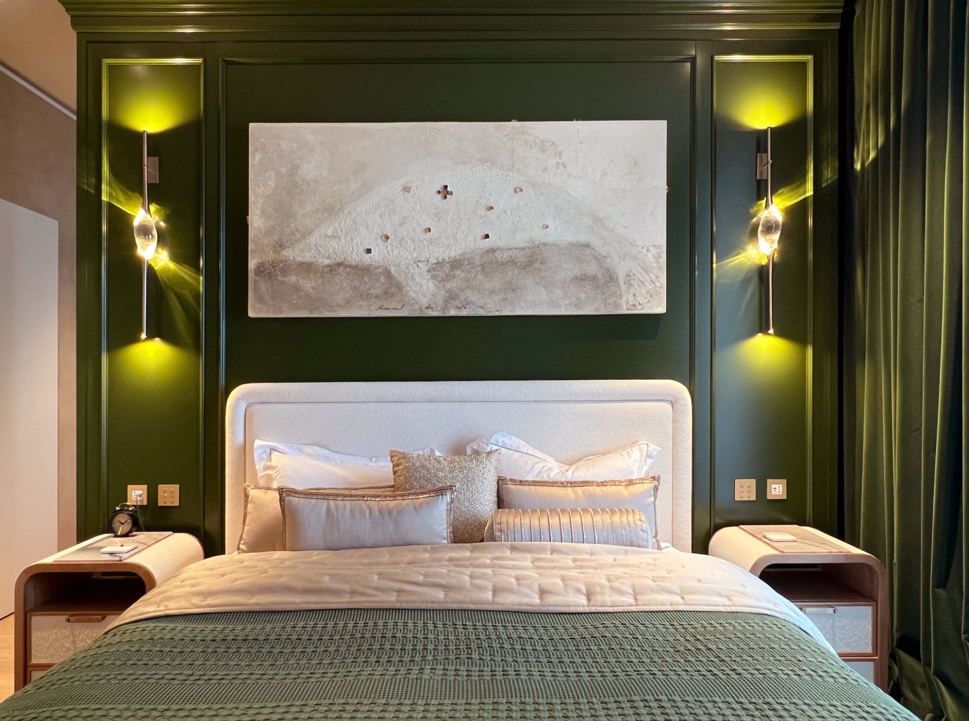 Two Il Pezzo 12 Wall Sconce at the sides of the bed in a room with green boiserie, Bucharest