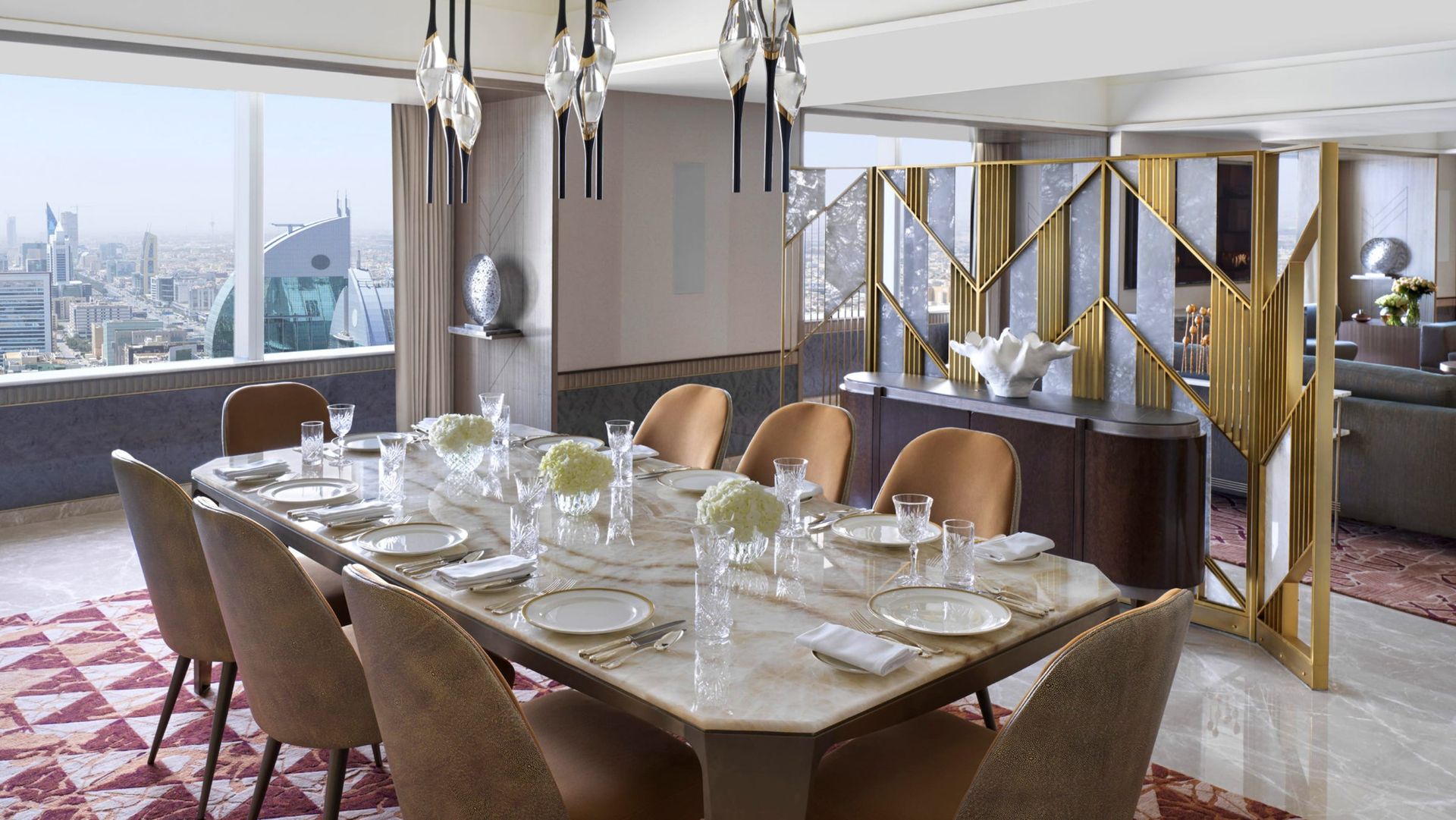 Three Il Pezzo 12 Round Chandeliers over the dining table of the Royal Suite, Four Seasons Hotel Riyadh at Kingdom Centre