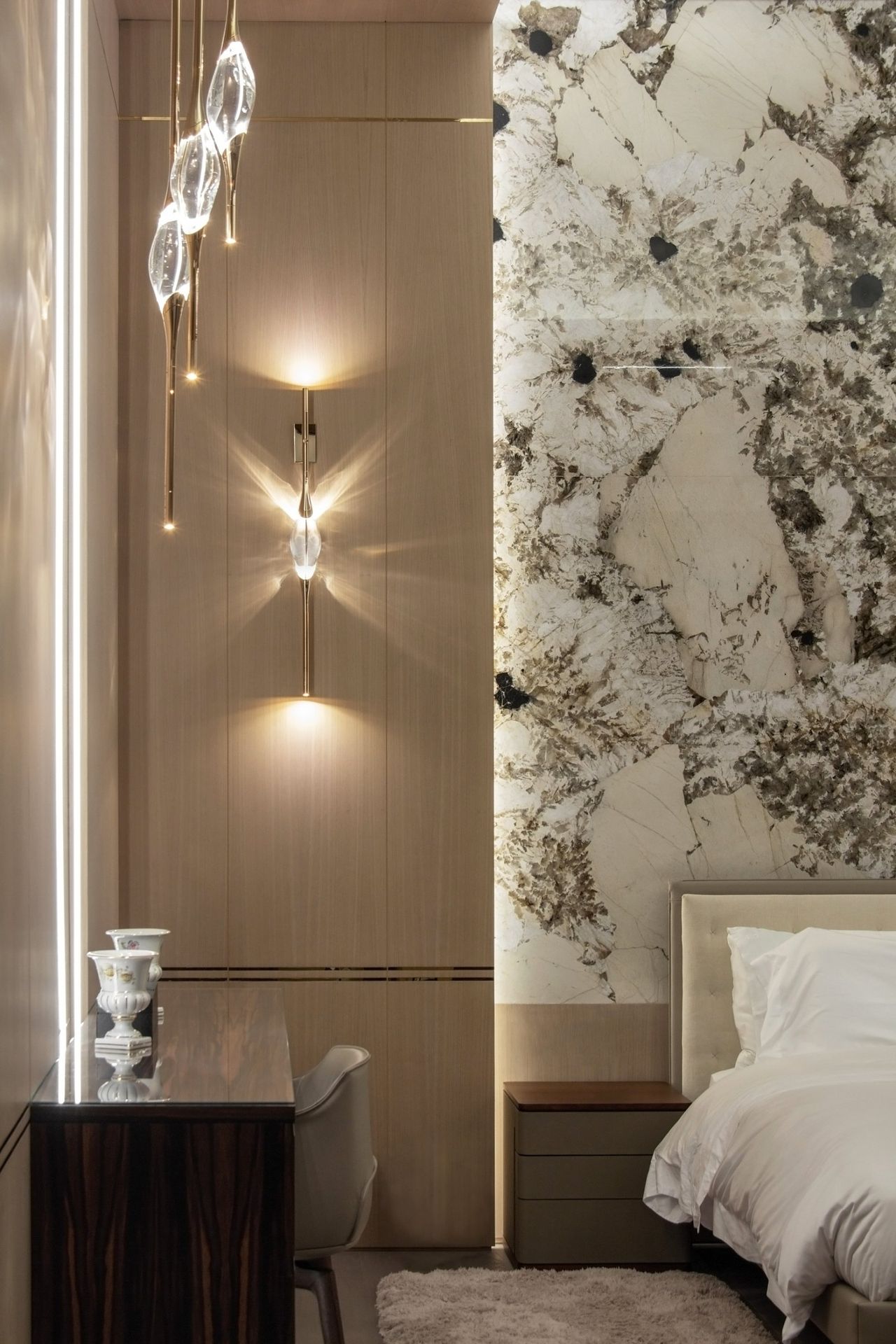 Il Pezzo 12 Round Chandelier and Wall Sconce in a bedroom at Zaitunay Bay, Beirut